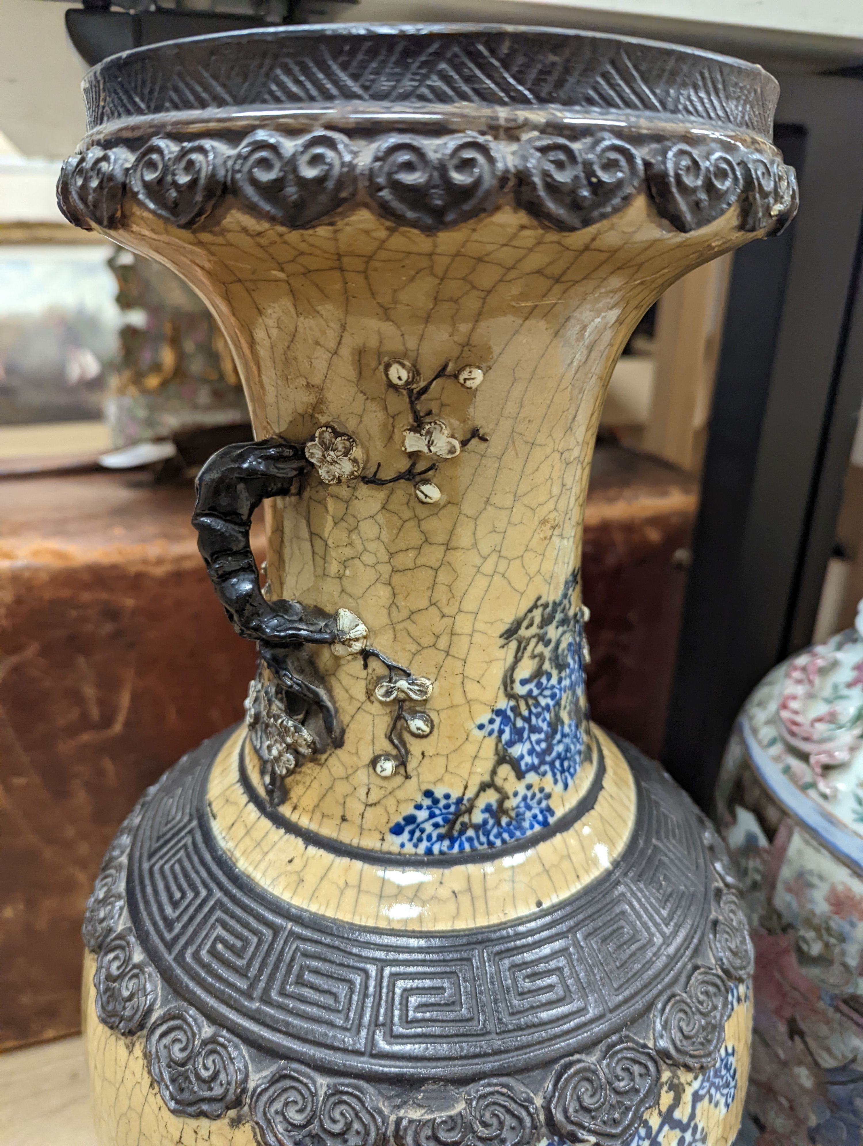 A large Chinese crackle glaze vase, late 19th/early 20th century and a large Chinese famille rose vase, late 19th century, tallest 60 cm.